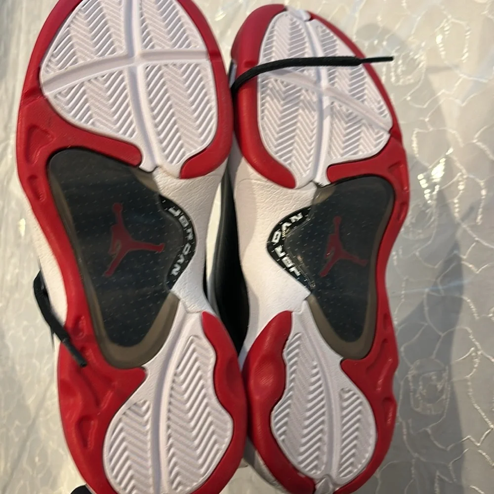 Brand new Nike night top jordans men's size 8! Black white and red leather